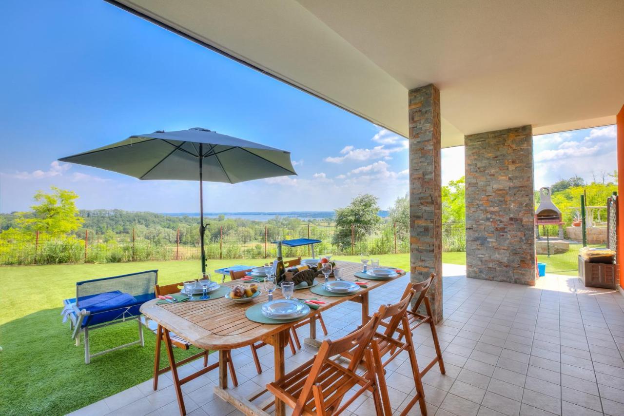 Villa Teresa Apt Lake Garda View - Happy Rentals سويانو ديل لاغو المظهر الخارجي الصورة