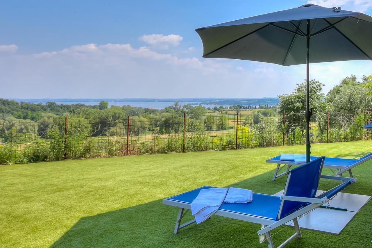Villa Teresa Apt Lake Garda View - Happy Rentals سويانو ديل لاغو المظهر الخارجي الصورة