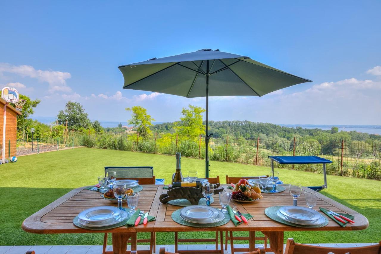 Villa Teresa Apt Lake Garda View - Happy Rentals سويانو ديل لاغو المظهر الخارجي الصورة