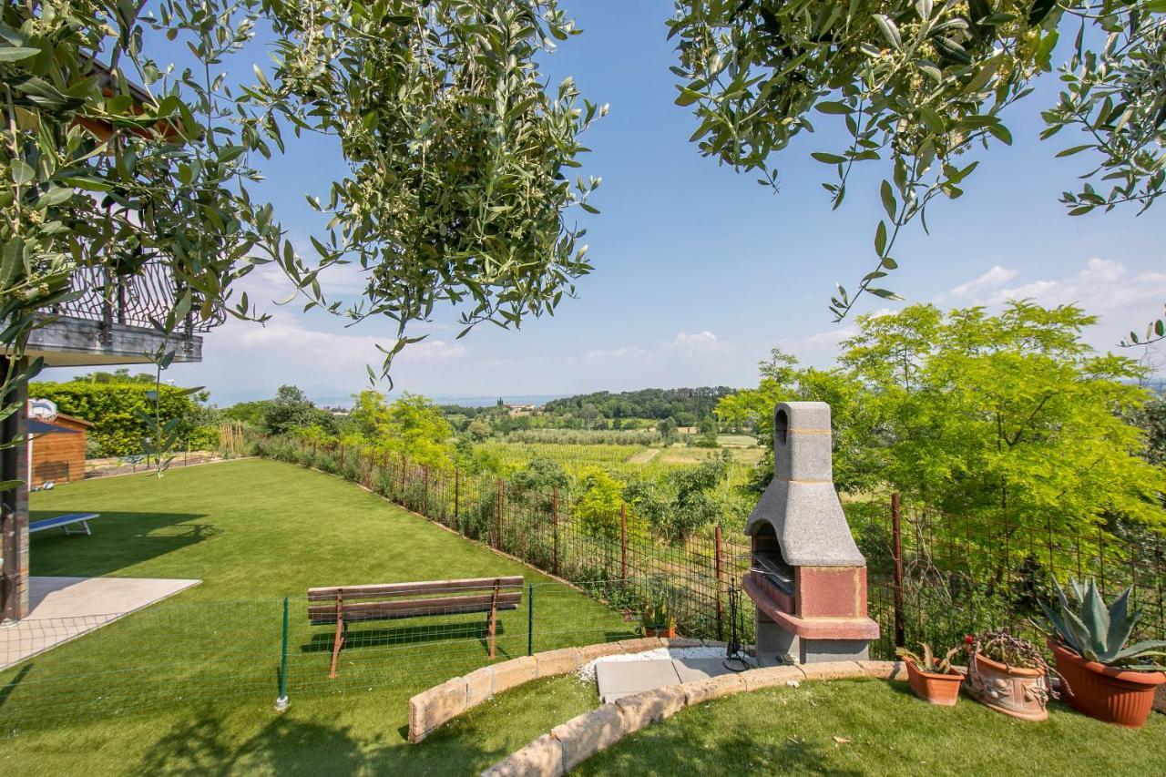 Villa Teresa Apt Lake Garda View - Happy Rentals سويانو ديل لاغو المظهر الخارجي الصورة